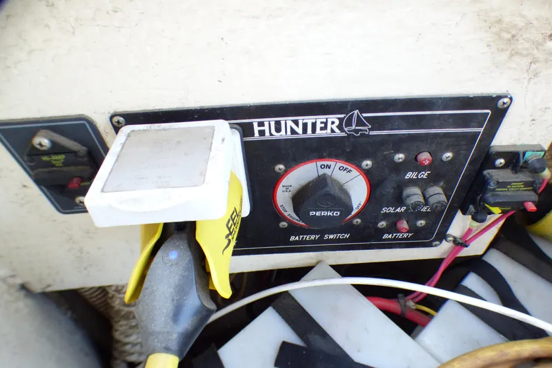 Control panel of a 1993 Hunter 40.5 sailboat with battery switch and wiring.