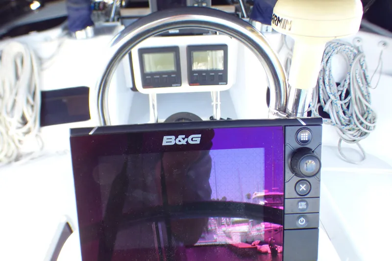 Cockpit of 1993 Hunter 40.5 sailboat with B&G navigation system and Garmin equipment.