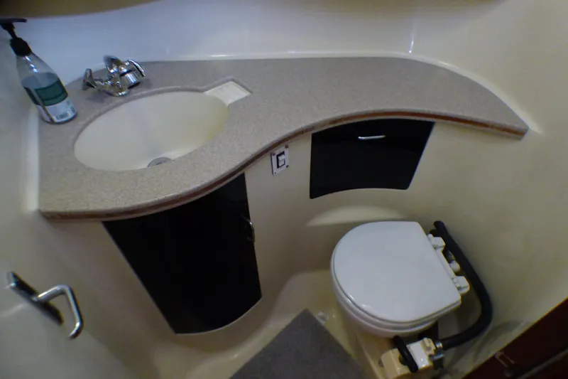 Bathroom interior of 1993 Hunter 40.5 yacht with sink and toilet.
