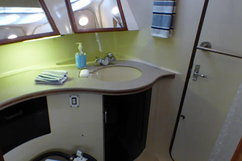 Interior of 1993 Hunter 40.5 yacht bathroom with sink and towel.