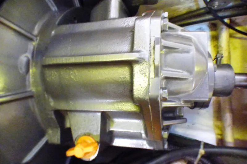 Close-up of a 1993 Hunter 40.5 engine component with metallic finish and orange valve.