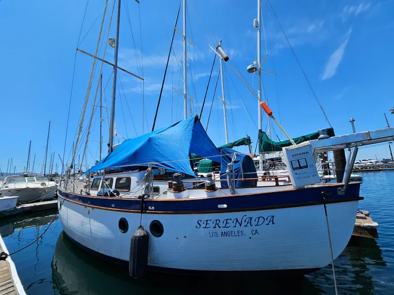 1985 Spindrift Pilot House Cutter Serenada docked in Los Angeles marina.