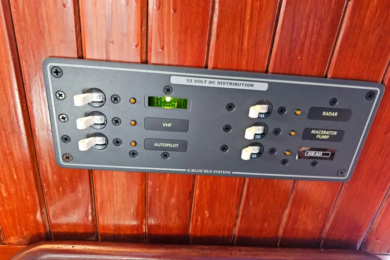 Electrical control panel on a 1985 Spindrift Pilot House Cutter sailboat.