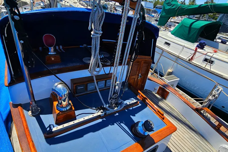 1985 Spindrift Pilot House Cutter sailboat cockpit with rigging and winches.