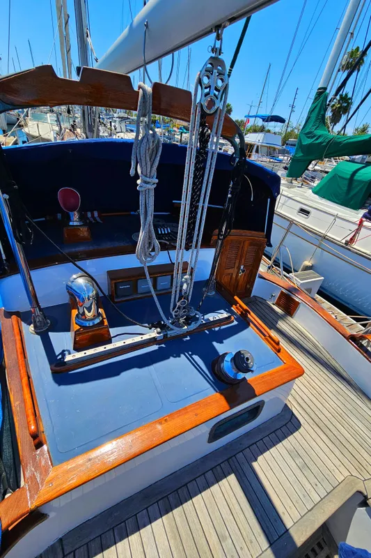 1985 Spindrift Pilot House Cutter sailboat deck with rigging and equipment.