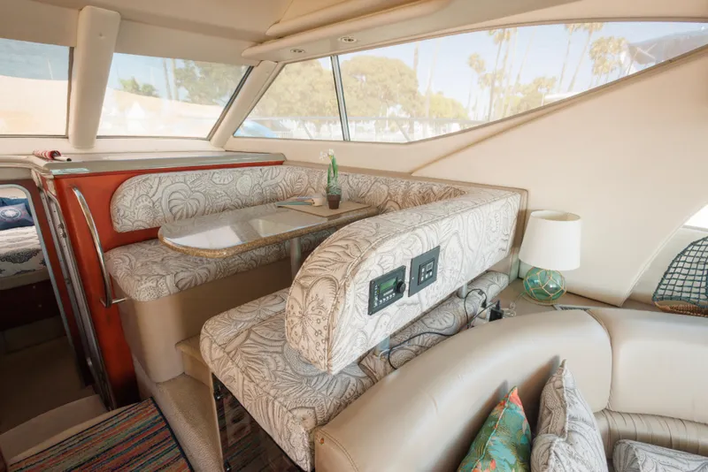 Interior of 1997 Maxum 4600 SCB yacht with elegant seating and modern decor.