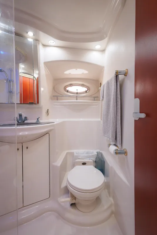 1997 Maxum 4600 SCB yacht bathroom with modern fixtures and compact design.