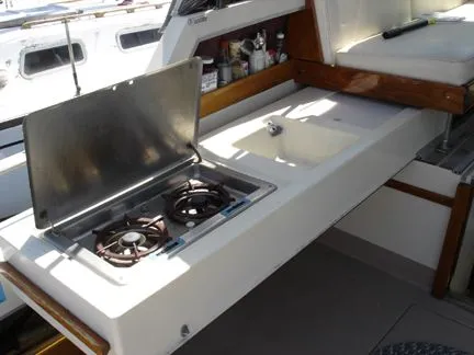 Pull-out galley under exterior seating