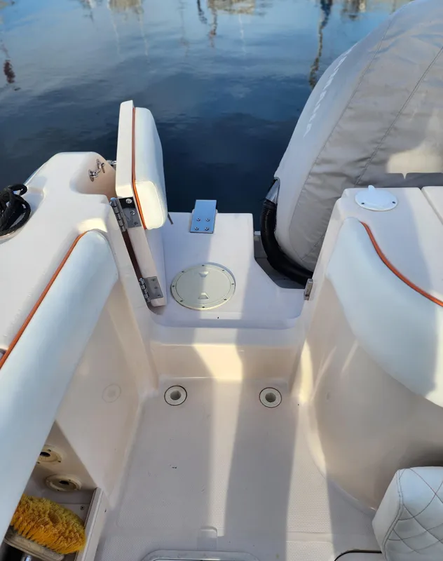 2005 Grady-White Bimini 306 boat interior, featuring seating and deck details.