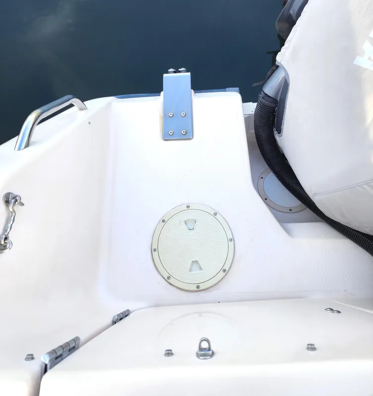 2005 Grady-White Bimini 306 boat deck with seating and hatch detail.