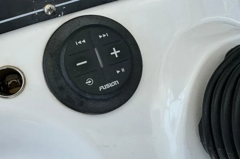 Control panel on 2008 Boston Whaler 285 Conquest boat with Fusion audio system.