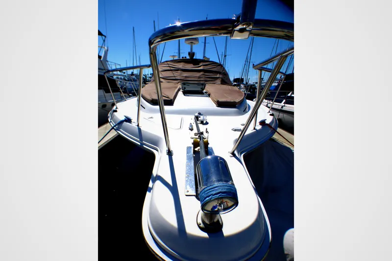 2002 Sea Ray 340 Amberjack boat deck with railing and covered seating area.