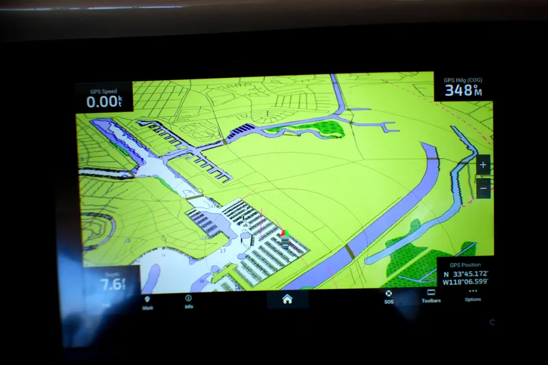 GPS navigation screen on a 2002 Sea Ray 340 Amberjack boat, showing marina map.