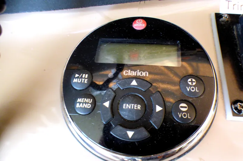 Clarion audio control panel on 2002 Sea Ray 340 Amberjack boat dashboard.