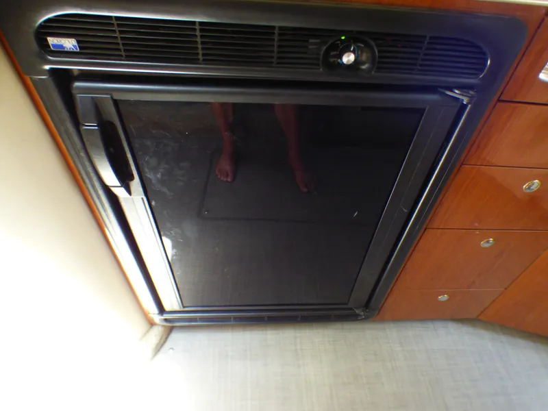 Sea Ray 340 Amberjack 2002 kitchen area with refrigerator.