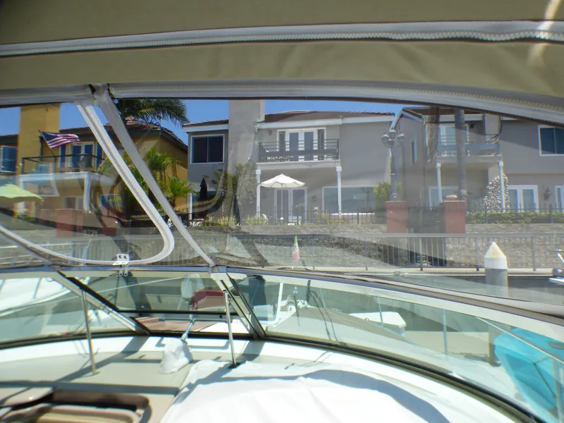 View from a 2002 Sea Ray 340 Amberjack overlooking waterfront homes.