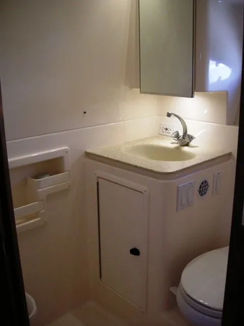 Head with Vacu-flush Toilet