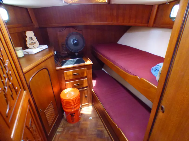 1980 CHB Heritage 42 Trawler cabin with wooden interior and bunk beds