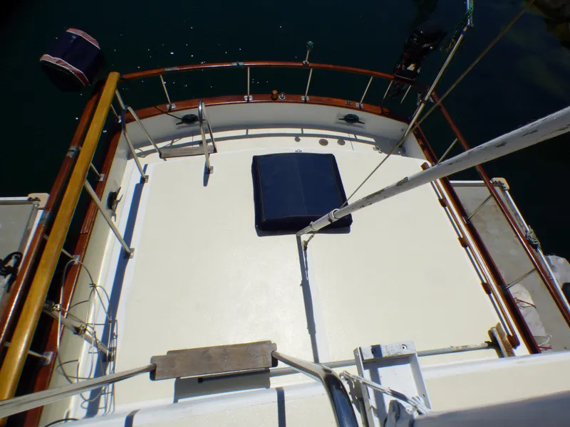 Top deck of a 1980 CHB Heritage 42 Trawler, featuring a spacious layout.