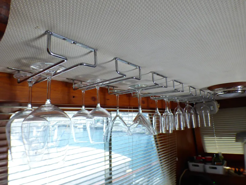 Wine glass rack in 1980 CHB Heritage 42 Trawler interior.