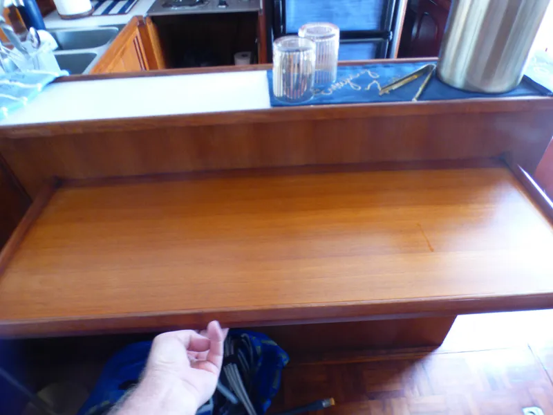 1980 CHB Heritage 42 Trawler interior, wooden counter and kitchen area.