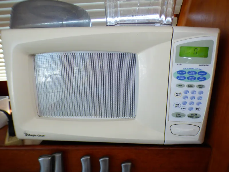 Microwave oven inside a 1980 CHB Heritage 42 Trawler.