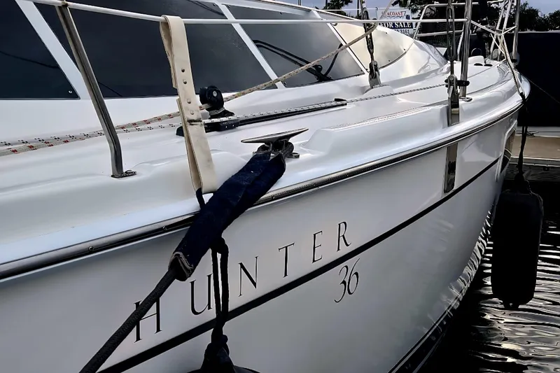 2012 Hunter 36 sailboat docked, showcasing sleek design and polished exterior.