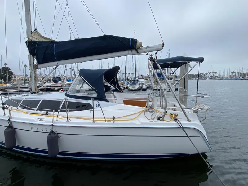 2012 Hunter e36 sailboat docked in a marina.