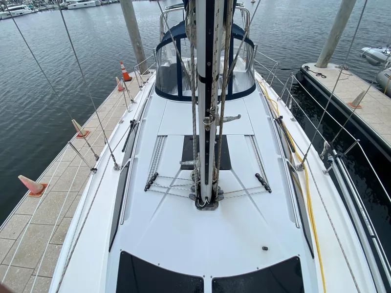 2012 Hunter e36 sailboat docked at marina, top deck view.