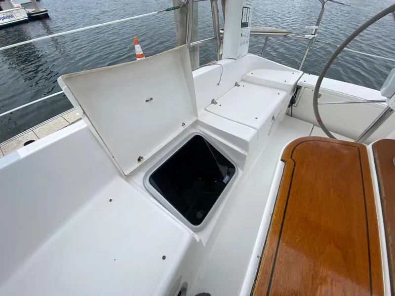 Open storage compartment on a 2012 Hunter e36 sailboat deck.