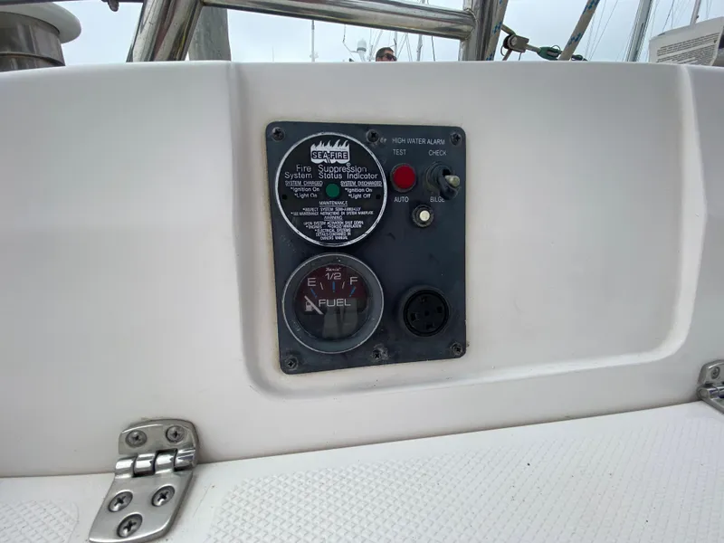Control panel of a 2012 Hunter e36 sailboat with fuel gauge and switches.