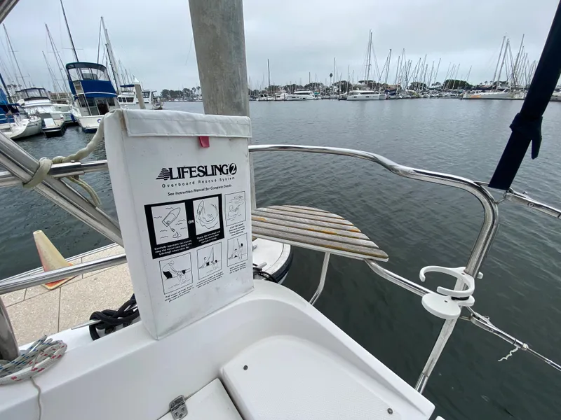 Hunter e36 2012 sailboat with Lifesling overboard rescue system at marina.