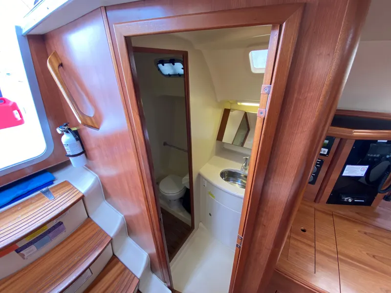 Interior of 2012 Hunter e36 sailboat showing bathroom with sink and toilet.