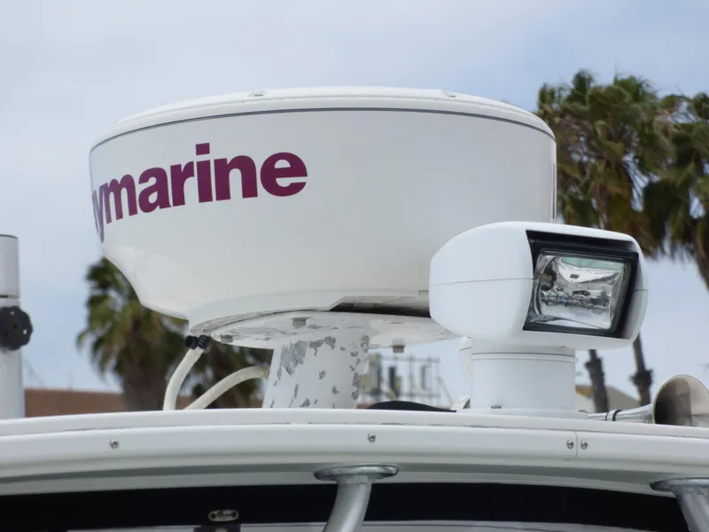 Radar and spotlight on 2004 Robalo R265 Walkaround boat.