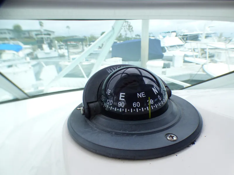 Compass on 2004 Robalo R265 Walkaround boat, docked at marina.