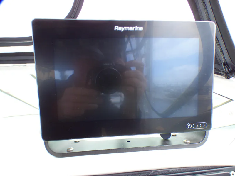 Raymarine display on 2004 Robalo R265 Walkaround boat dashboard.