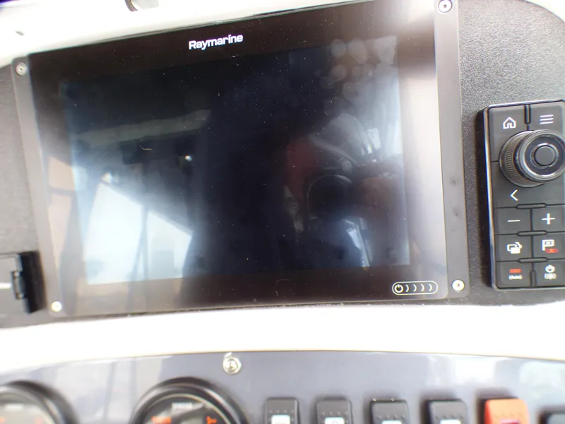 Raymarine display on 2004 Robalo R265 Walkaround boat dashboard.