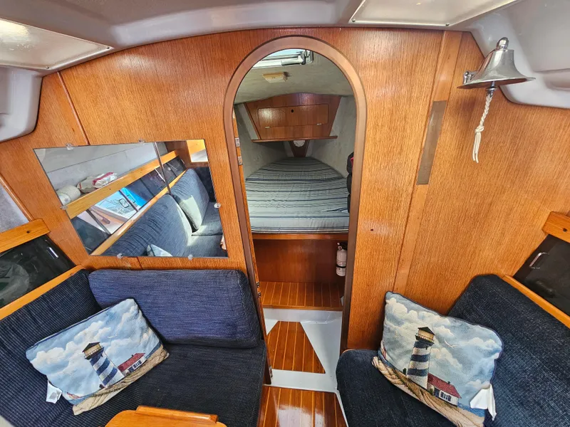 Interior of 1988 Hunter Legend 35 sailboat with cozy seating.