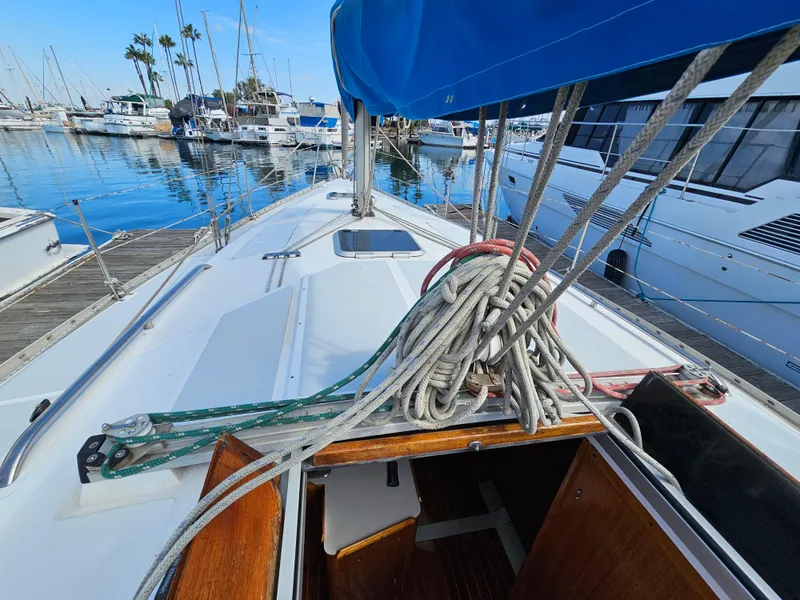 Deck of a 1988 Hunter Legend 35 sailboat in harbor.
