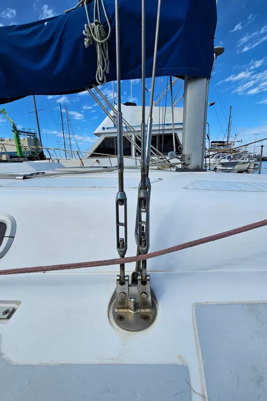 Close-up of 1988 Hunter Legend 35 sailboat rigging in marina.