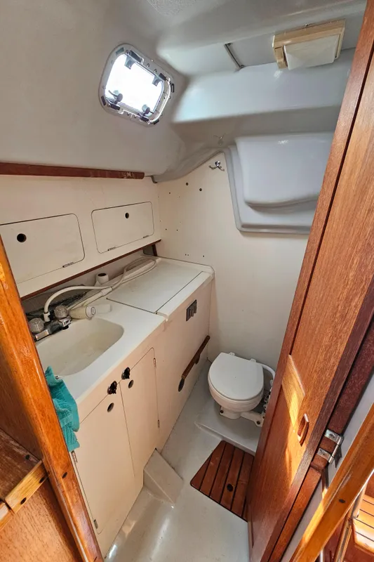 Interior of a 1988 Hunter Legend 35 yacht, bathroom view.