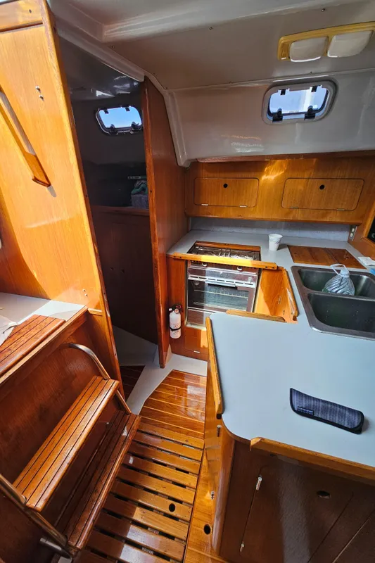Interior of a 1988 Hunter Legend 35 yacht with wooden finish.