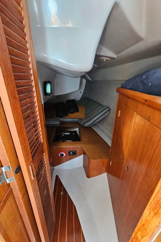 Interior of a 1988 Hunter Legend 35 yacht with wooden furnishings.