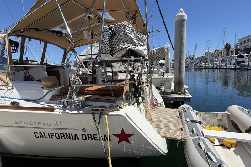 Beneteau Oceanis 37 sailboat docked in marina, named "California Dream," year 2010.