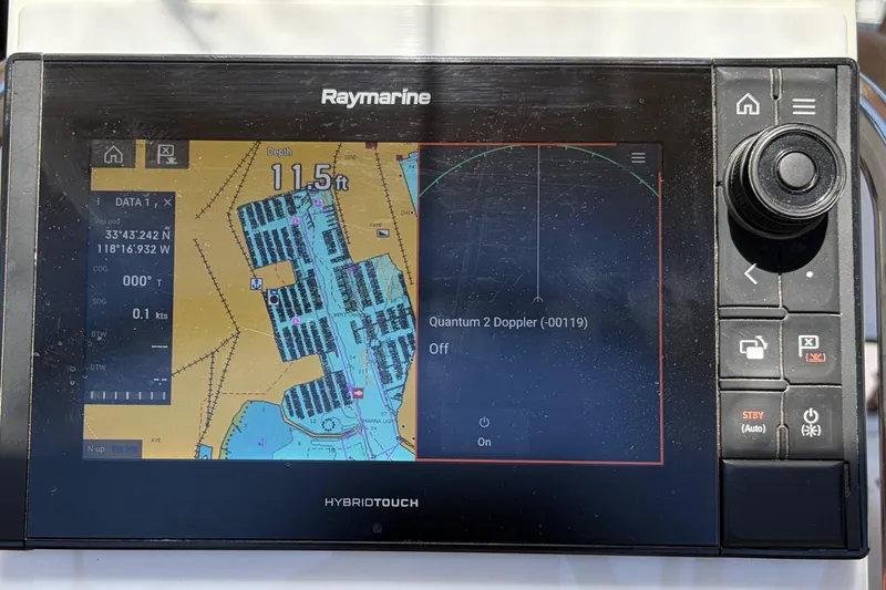 Raymarine navigation display on 2010 Beneteau Oceanis 37, showing depth and coordinates.