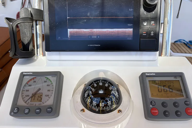 Control panel of a 2010 Beneteau Oceanis 37 sailboat with navigation instruments.