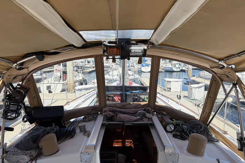 Cockpit view of 2010 Beneteau Oceanis 37 sailboat docked at marina.