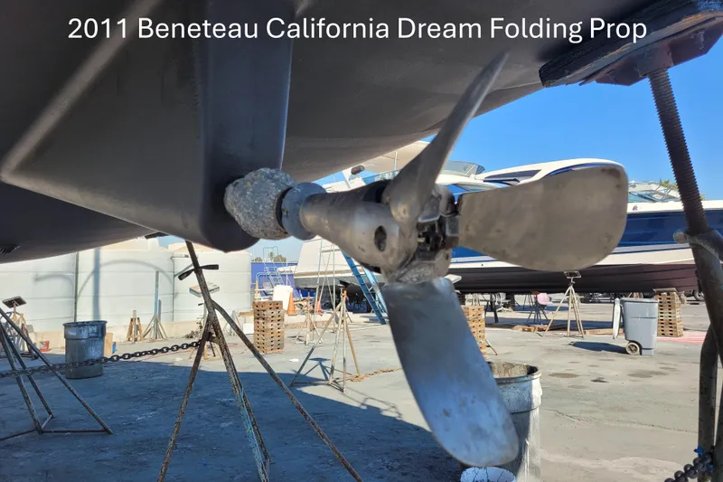 2011 Beneteau Oceanis 37 with California Dream folding propeller in a boatyard setting.