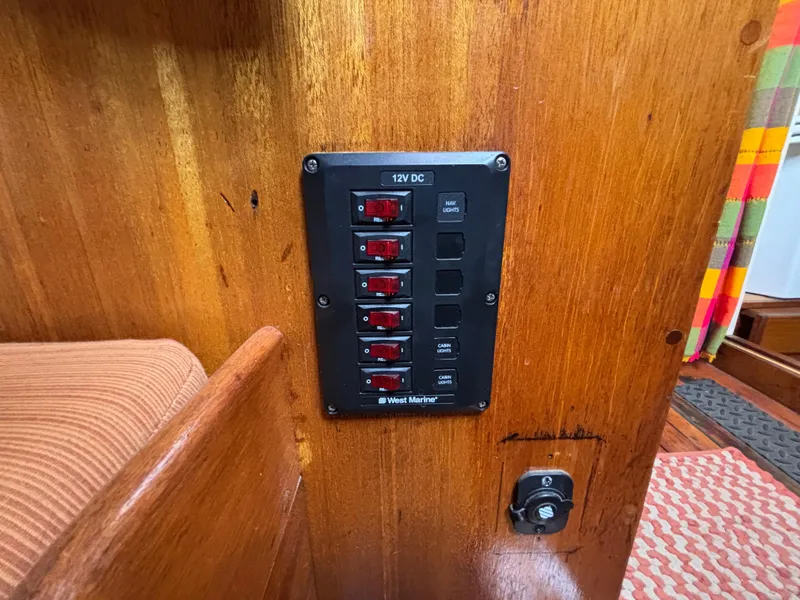 12V DC panel on 1975 Custom 45’ Thomas Colvin “Tamarack” Schooner, wooden interior.