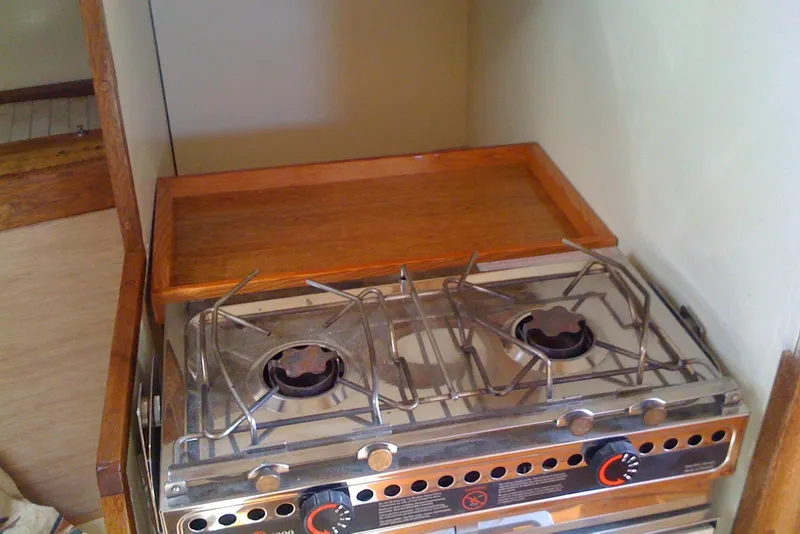 Two-burner stove in 1975 Custom 45’ Thomas Colvin “Tamarack” Schooner galley.